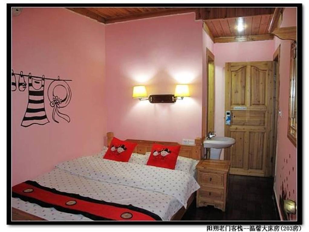 老门客栈 Hotel Yangshuo Quarto foto